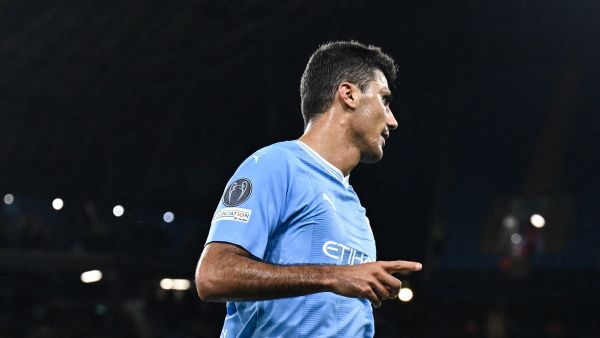 Manchester City's Spanish midfielder #16 Rodri celebrates scoring his team third goal during the UEFA Champions League Group G football match between Manchester City and FC Crvena Zvezda (Red Star Belgrade) at the Etihad Stadium in Manchester, north west England, on September 19, 2023. (Photo by Oli SCARFF / AFP)