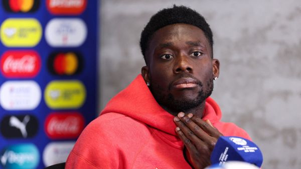 Canada's midfielder #19 Alphonso Davies speaks during a press conference one day before the Conmebol 2024 Copa America tournament group A football match between Argentina and Canada at Mercedes Benz Stadium in Atlanta, Georgia, on June 19, 2024. (Photo by Charly TRIBALLEAU / AFP)