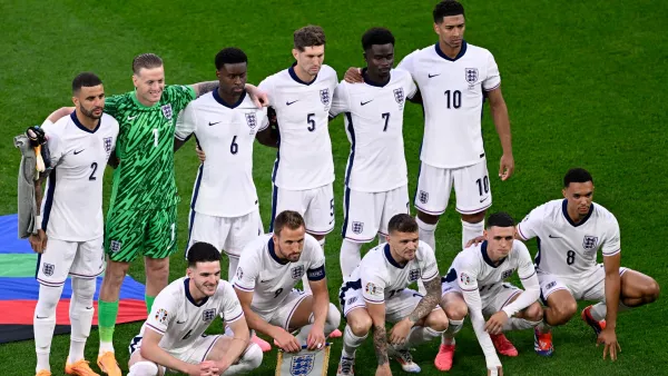 England's players pose for a team picture during the UEFA Euro 2024 Group C football match between Serbia and England at the Arena AufSchalke in Gelsenkirchen on June 16, 2024. (Photo by INA FASSBENDER / AFP)
