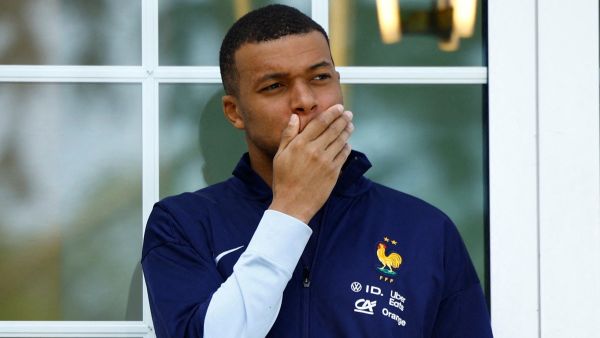 French forward Kylian Mbappe waits for the arrival of French President for a lunch at the team's training camp, as part of the team's preparation for the UEFA Euro 2024 European football championships in Clairefontaine-en-Yvelines on June 3, 2024. (Photo by Sarah Meyssonnier / POOL / AFP)