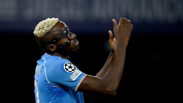 Napoli's Nigerian forward #09 Victor Osimhen reacts during the UEFA Champions League round of 16 first Leg football match between Napoli and Barcelona at the Diego-Armando-Maradona stadium in Naples on February 21, 2024. (Photo by Filippo MONTEFORTE / AFP)