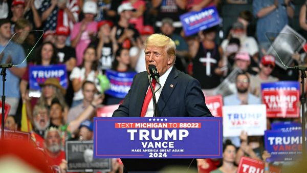 Former US President and 2024 presidential nominee Donald Trump speaks during a campaign rally with US Senator and vice presidential nominee J.D. Vance at Van Andel Arena in Grand Rapids, Michigan, on July 20, 2024. (Photo by Jim WATSON / AFP) Trump