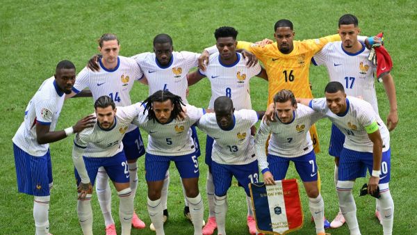 France's players pose for a team picture before the start of the UEFA Euro 2024 round of 16 football match between France and Belgium at the Duesseldorf Arena in Duesseldorf on July 1, 2024. (Photo by Alberto PIZZOLI / AFP)