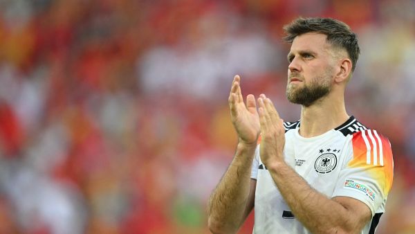 Germany's forward #09 Niclas Fullkrug applauds the fans after the UEFA Euro 2024 quarter-final football match between Spain and Germany at the Stuttgart Arena in Stuttgart on July 5, 2024. (Photo by Fabrice COFFRINI / AFP)
