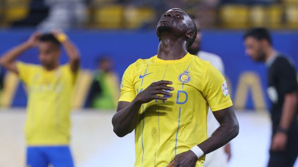 Nassr's Senegalese Forward #10 Sadio Mane reacts after missing a penalty during the Saudi Pro League football match between Al-Nassr and Al-Feiha at Al -Awwal Stadium in Riyadh on April 19, 2024. (Photo by Fayez NURELDINE / AFP)