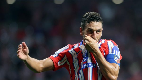 كوكي نجم أتلتيكو (Photo by Pierre-Philippe MARCOU / AFP)