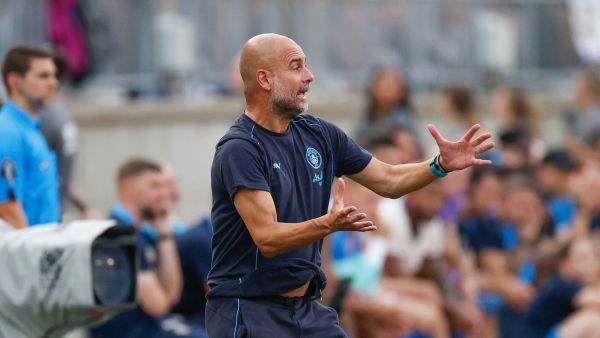 Manchester City's Spanish manager Pep Guardiola directs his team during the second half of the pre-season club friendly football match between Manchester City and Chelsea at Ohio Stadium in Columbus, Ohio, August 3, 2024. (Photo by KAMIL KRZACZYNSKI / AFP)