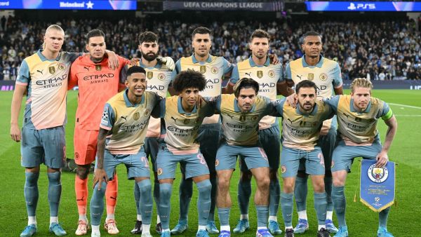 فريق مانشستر سيتي (Photo by Oli SCARFF / AFP)