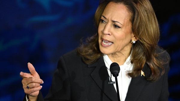 Was Kamala Harris wearing earbuds earrings?