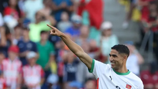 Morocco's defender #02 Achraf Hakimi celebrates scoring his team's sixth goal in the men's bronze medal football match between Egypt and Morocco during the Paris 2024 Olympic Games at the La Beaujoire Stadium in Nantes on August 8, 2024. (Photo by Alain JOCARD / AFP)