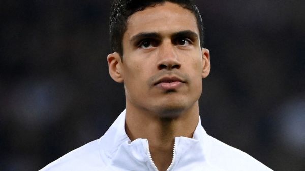 France's defender Raphael Varane listen to the nation anthem during the friendly football match between France and South Africa at the Pierre-Mauroy Stadium in Villeneuve d'Ascq, near Lille, northern France, on March 29, 2022. (Photo by FRANCK FIFE / AFP)