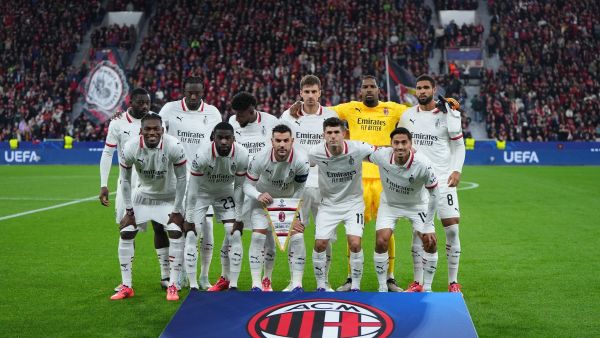 AC Milan players pose for the team photo prior to the UEFA Champions League football match between Bayer 04 Leverkusen and AC Milan in Leverkusen, western Germany on October 1, 2024. (Photo by Pau BARRENA / AFP)