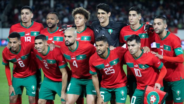 Morocco's players pose for a team photo before the international friendly football match between Morocco and Angola at Adrar Stadium in Agadir, Morocco, on March 22, 2024. (Photo by FADEL SENNA / AFP)