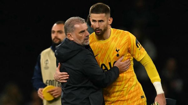 Tottenham Hotspur's Greek-Australian Head Coach Ange Postecoglou congratulates Tottenham Hotspur's Italian goalkeeper #01 Guglielmo Vicario after the UEFA Europa League League stage football match between Tottenham Hotspur and at the Tottenham Hotspur Stadium in London, on September 26, 2024. Tottenham won the match 3-0. (Photo by Glyn KIRK / AFP)