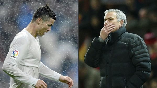 مورينيو ورونالدو (Photo by JAVIER SORIANO and Oli SCARFF / AFP)