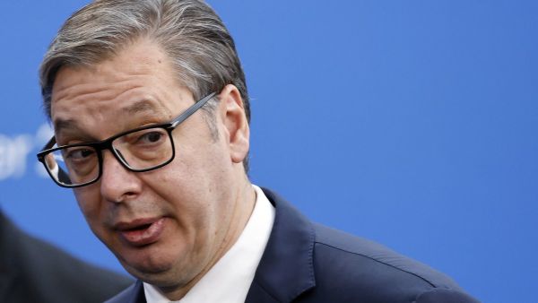 Serbia's President Aleksandar Vucic answers journalists questions upon arrival for the European Political Community Summit in Budapest, on November 7, 2024. (Photo by Ludovic MARIN / AFP)