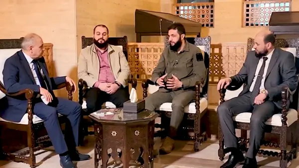 Syrian opposition and government leaders convene to coordinate power transition