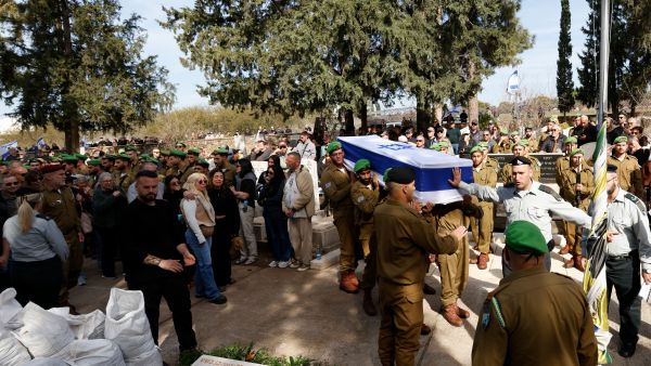 Israeli soldiers carry the coffin of Staff Sergeant Yahav Hadar from Nahal Brigade, who was killed in confrontations in northern Gaza, during his funeral in the northern Israeli town of Kfar Tavor. AFP Five Israeli soldiers killed in Gaza missile strike