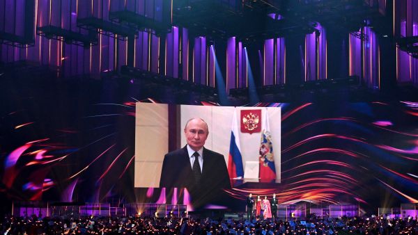 Putin offers arms control extension but warns west against all-out escalation