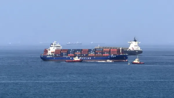 Foreign cargo ship runs aground in Strait of Hormuz as Iran defends shipping controls