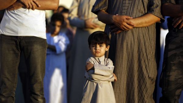 Restricted movement due to the Israeli occupation has made Eid difficult for many Palestinians. (AFP/Mohammed Abed)