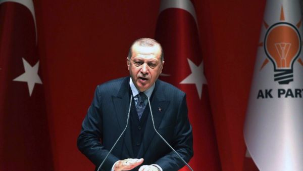 Turkey's President and leader of the Justice and Development Party (AKP) Recep Tayyip Erdogan delivers a speech during the AKP's extended meeting of provincial heads at the party's headquarters in Ankara on Feb. 23, 2018. 
(ADEM ALTAN / AFP)