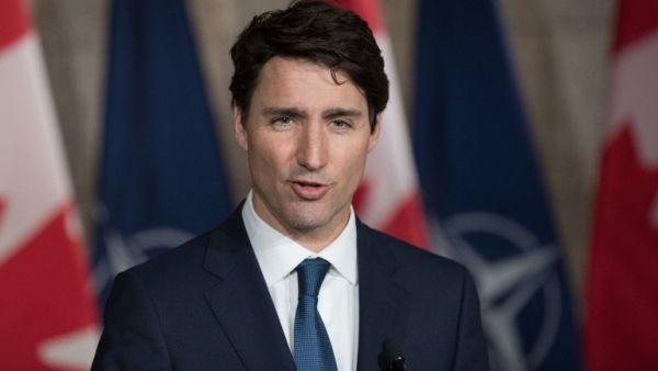 Canadian Prime Minister Justin Trudeau speaks during a joint media availability with NATO Secretary General, Jens Stoltenberg in Ottawa, Ontario, on Apr. 4, 2018. 
(Lars Hagberg / AFP)