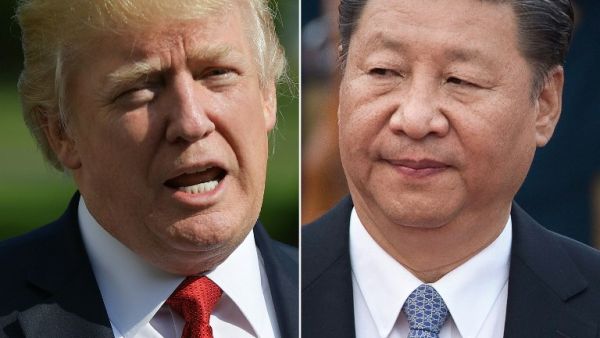 (COMBINED) This combination of file photos on Sep.18, 2017 shows U.S. President Donald Trump speaking about Hurricane Irma upon in Washington, DC on Sep.10, 2017 and taken on Sep.13, 2017 showing Chinese President Xi Jinping during a welcome ceremony outside the Great Hall of the People welcoming Sultan of Brunei Hassanal Bolkiah (not seen) in Beijing. (MANDEL NGAN, NICOLAS ASFOURI / AFP)