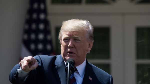 U.S. President Donald Trump speaks about tax cuts for Americans from the Rose Garden at the White House on Apr. 12, 2018 in Washington, DC. 
(NICHOLAS KAMM / AFP)
