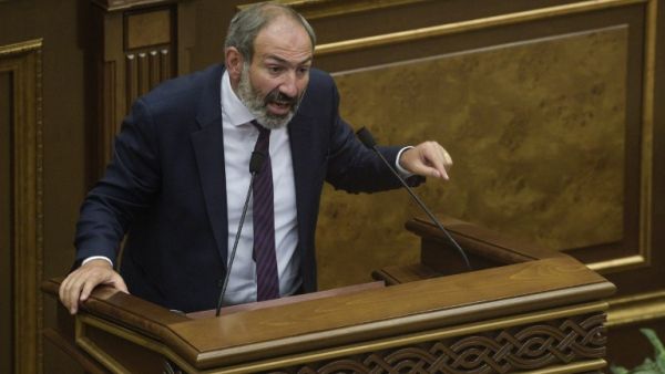 Armenian opposition leader Nikol Pashinyan answers lawmakers' questions at the extraordinary session of parliament to elect a new prime minister/ AFP