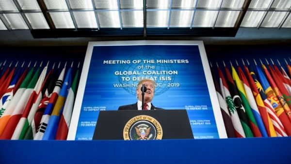 US President Donald Trump speaks the Ministers of the Global Coalition to Defeat ISIS at the US Department of State February 6, 2019 in Washington, DC (AFP)