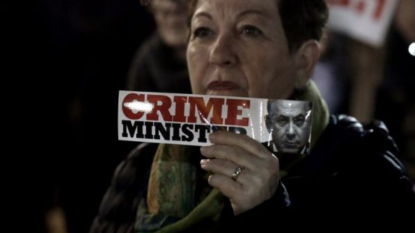 Israeli protesters participated in a march demanding that Israeli Prime Minister Benjamin Netanyahu resign over corruption allegations (AFP)