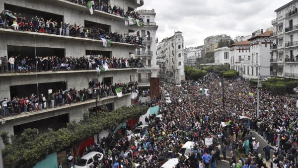 Algerian protesters demonstrate against their ailing president's bid for a fifth term in power, in Algiers on March 8, 2019. (RYAD KRAMDI / AFP)