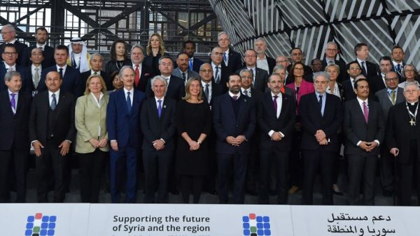 Officials pose for a photograph during the third Brussels conference on "supporting future of Syria and the region" at the European Council in Brussels on March 14, 2019. (EMMANUEL DUNAND / AFP)