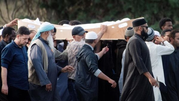 Mourners proceed with the coffin of a shooting victim, slain by an Australian white supremacist gunman who went on a killing spree at two mosques, at the Memorial Park cemetery in Christchurch. (AFP/ File)