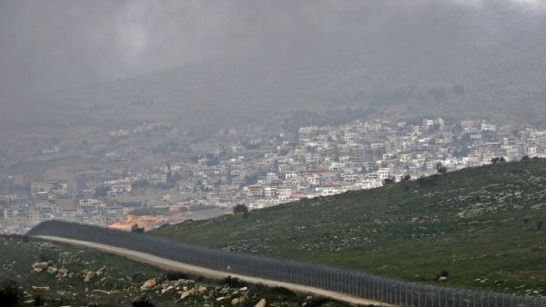 sraeli fence separating the Israeli-occupied sector of the Golan Heights near the Druze town (AFP)