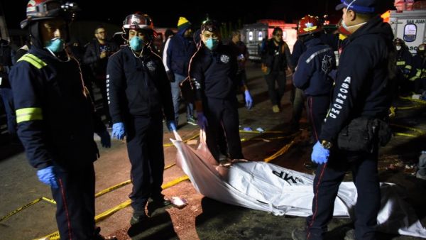 A truck driver barreled into a group of indigenous Guatemalans on March 28, killing 18 before fleeing the scene as police began a manhunt. (JOHAN ORDONEZ / AFP)