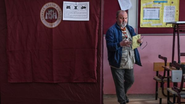 A man prepares to cast his ballot during the local elections in Istanbul on March 31, 2019 (AFP)