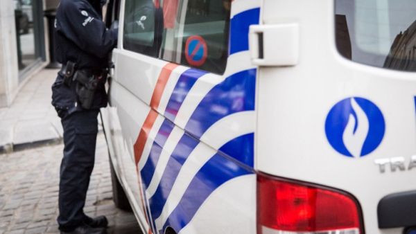 A Belgian police officer stands next to police car outside the Belgian Federal Police headquarters in Brussels on March 19, 2016. (AFP/Aurore Belot) A Belgian police officer stands next to police car outside the Belgian Federal Police headquarters in Brussels on March 19, 2016. (AFP/Aurore Belot)