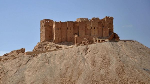 This file photo taken on May 18, 2015 shows a general view of the castle of the ancient Syrian city of Palmyra, a day after Daesh fired rockets into the city and killing five people. (AFP/File)