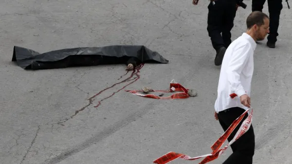 The body of a Palestinian assailant who was allegedly shot in the head by an Israeli soldier as he lay wounded on the ground Hebron on March 24, 2016. (AFP/Hazem Bader)