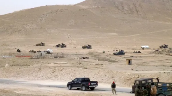 Syrian pro-government forces hold a position on the outskirts of Palmyra on March 26, 2016, during a military operation to retake the ancient city from Daesh. (AFP/Maher Al Mounes)