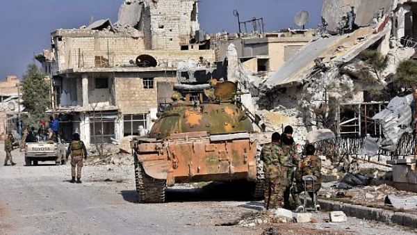 Comprised of recruits from Afghanistan, the Fatemiyoun is said to be the biggest military unit deployed by Iran in Iraq and Syria (AFP/File)