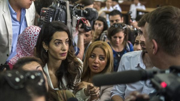 AP was criticized for describing Amal Clooney as an 'actor's wife' in coverage of the Al Jazeera trial. (AFP)