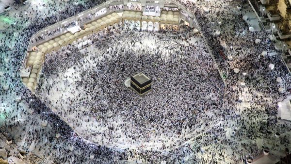 An aerial view shows Muslim pilgrims circumambulating the Kaaba, Islam's holiest shrine, at the Grand Mosque in Saudi Arabia's holy city of Mecca on September 3, 2017, during the annual Hajj pilgrimage. 
(BANDAR ALDANDANI / AFP)