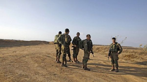 In a report to the government, the army warned that without U.S. financial aid, the PA "would find it difficult to maintain the capabilities of its security forces and [then] its desire to continue coordination with Israel" (AFP/File)