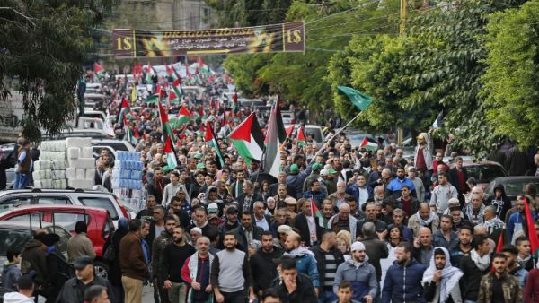 Palestinian and Lebanese protesters take to the streets in the Lebanese capital Beirut on Dec. 8, 2017, to denounce the widely criticized decision by U.S. President Trump to recognize Jerusalem as the capital of Israel (ANWAR AMRO/AFP) Palestinian and Lebanese protesters take to the streets in the Lebanese capital Beirut on Dec. 8, 2017, to denounce the widely criticized decision by U.S. President Trump to recognize Jerusalem as the capital of Israel (ANWAR AMRO/AFP)