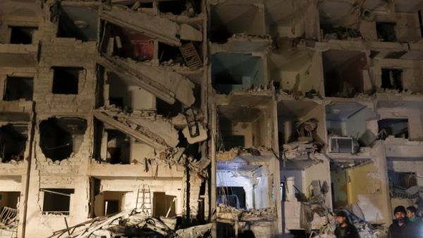 A picture shows the damage following an explosion at a base for Asian jihadists in a rebel-held area of the northwestern Syrian city of Idlib on Jan. 7, 2018 (OMAR HAJ KADOUR / AFP)


