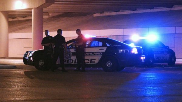 Police officers gather in Garland after two gunmen were shot dead outside a Prophet Muhammed cartoon contest, May 4, 2015. (AFP/File)