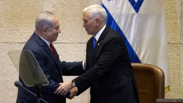 U.S. Vice President Mike Pence (R) shakes hands with Israeli Prime Minister Benjamin Netanyahu at the parliament in Jerusalem on Jan. 22, 2018 (ARIEL SCHALIT / POOL / AFP)
